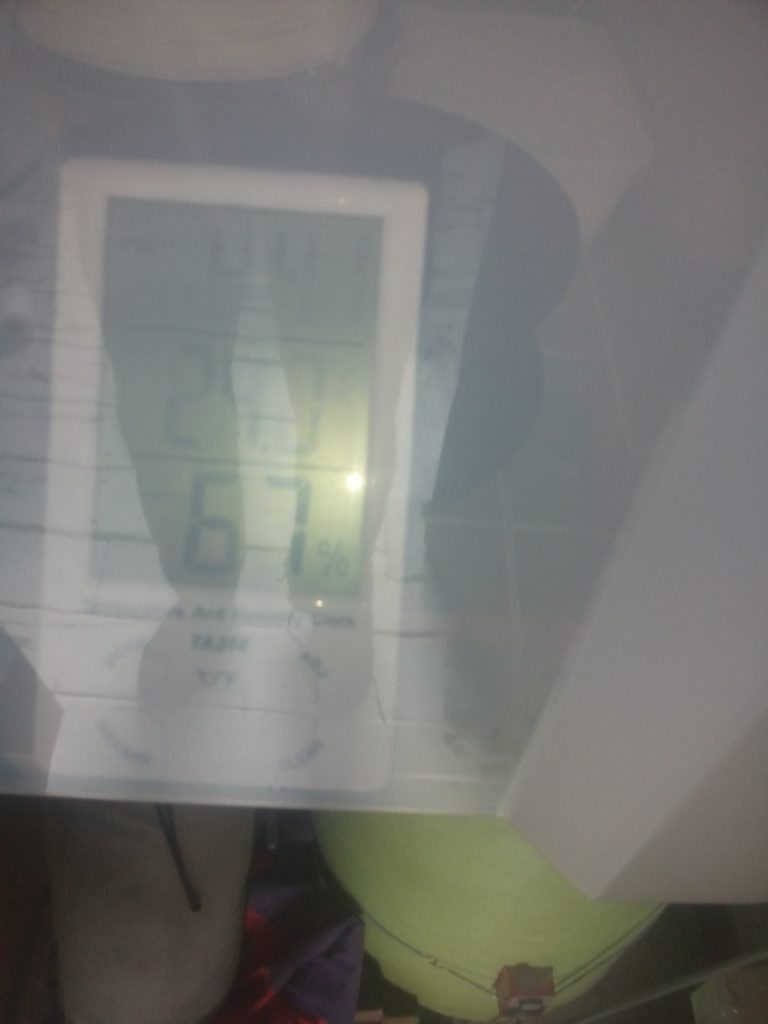 The box sealed with the hygrometer reading showing
